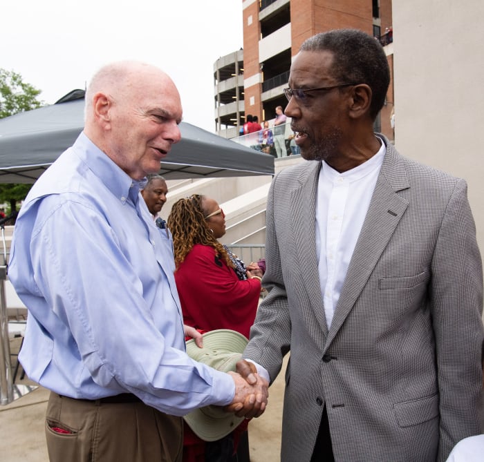 The University of Alabama honored its first two Black scholarship athletes, Wilbur Jackson and John Mitchell before the A-Day game at Bryant-Denny Stadium. Paul Bryant Jr. shakes hands with John Mitchell after the unveiling ceremony.